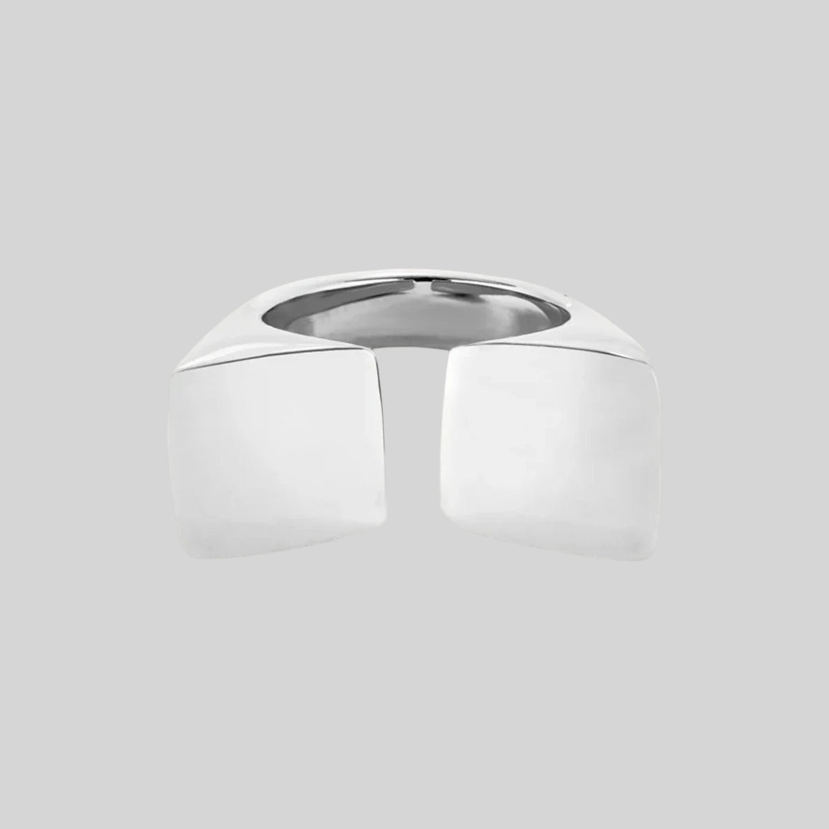 Silver architectural geometric open statement ring on neutral background by Modernist Mood