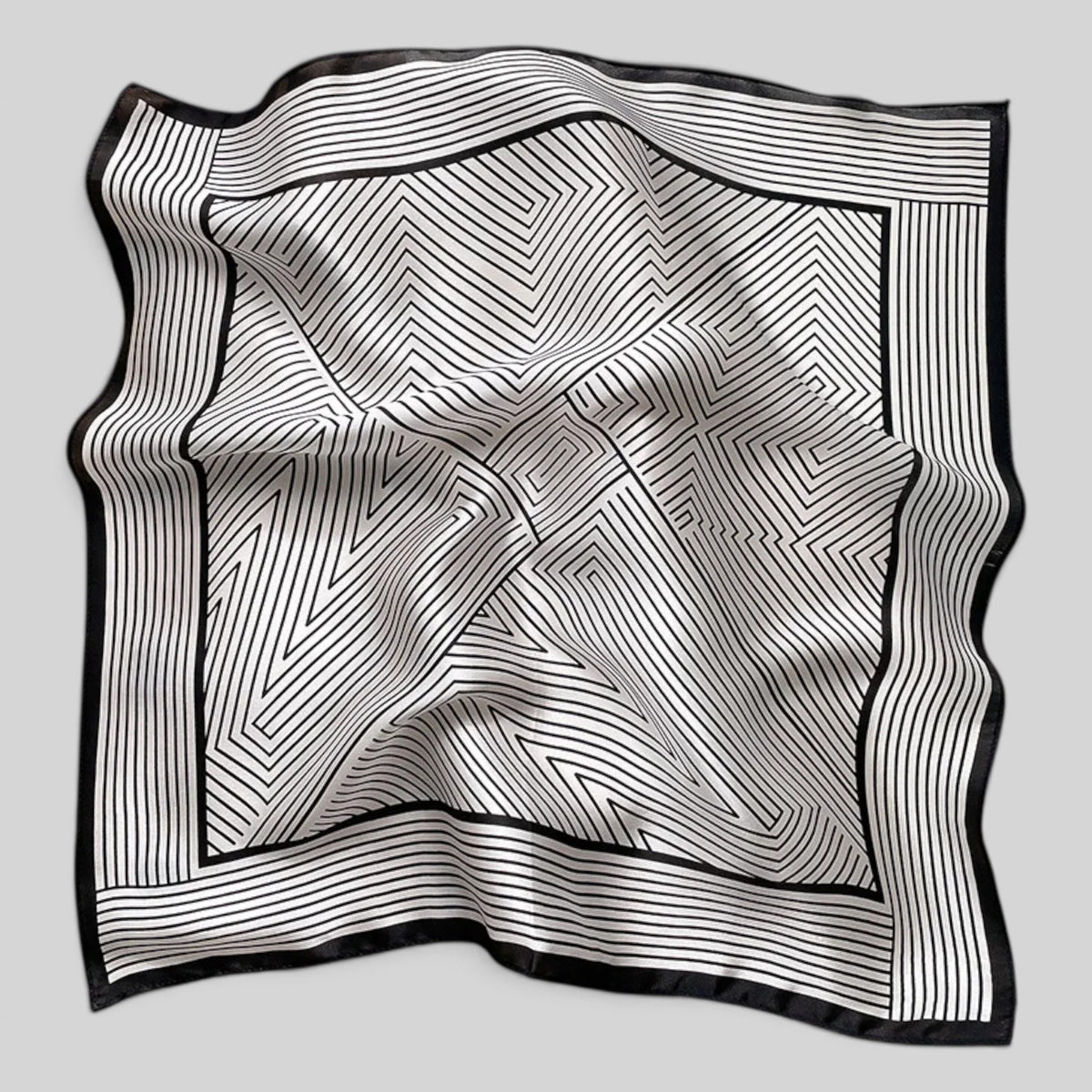 Black and white linear striped silk neckerchief flat lay by Modernist Mood