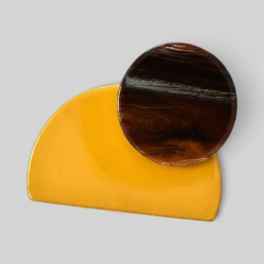 Mustard yellow and black semi-circular geometric color-blocked runway brooch by Modernist Mood